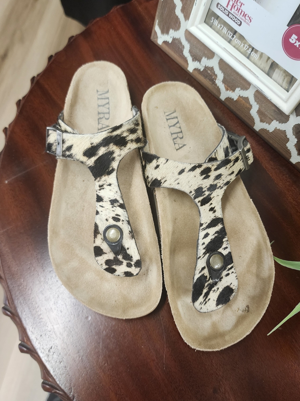 Myra Bag Women's Cow Print T-strap Sandals in Black & Cream